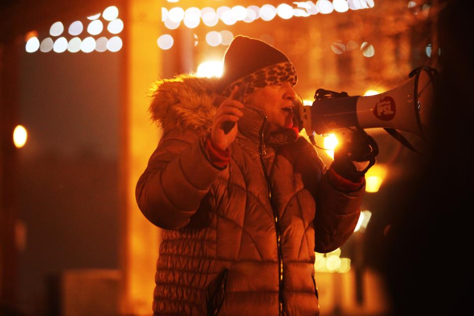 Tonya Claireborne speaks during a protest Sunday evening at Park Central Square.