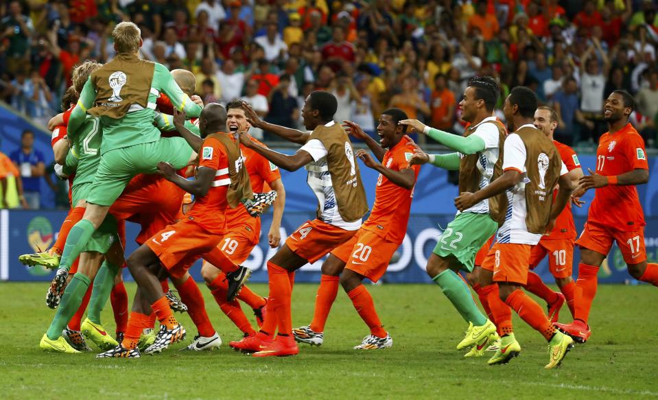 Goalkeeper Tim Krul of the Netherlands celebrates with teammates after the penalty shootout in the 2014 World Cup quarter-finals between Costa Rica and the Netherlands at the Fonte Nova arena in Salvador July 5, 2014. REUTERS/Paul Hanna