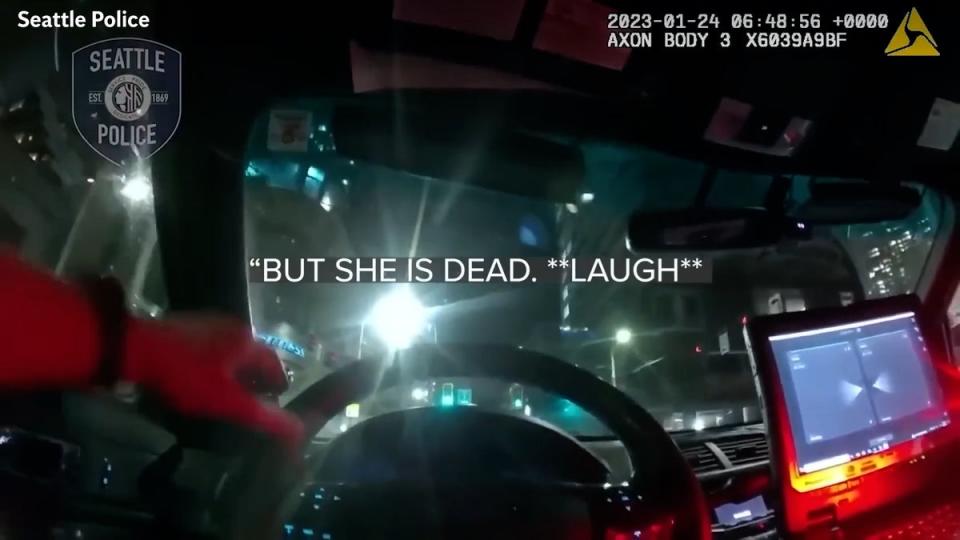 Shocking body cam footage shows a police officer laughing about a woman who was struck and killed by a patrol car in Seattle (Seattle Police)