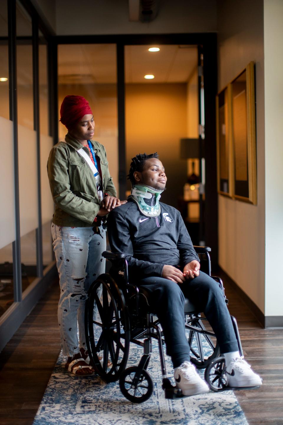 Mary S. Washington with her son Damarion Allen, 15, who was paralyzed from the chest down, on May 7 inside the Franklin County Juvenile Intervention Center.