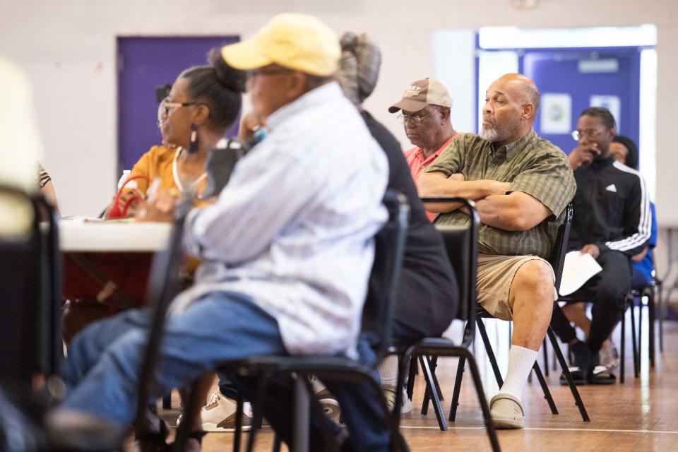 Attendees listen in as Terrance Cannon speaks about his family's experience during a Black Farmers & Agriculturalists Association meeting in Brownsville, Tenn. on Thursday, Aug. 3, 2023.