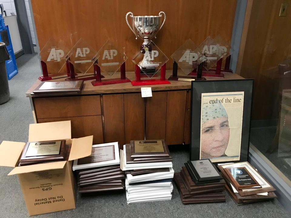 These are trophies and plaques from first place finishes in AP and Illinois Press Association over the past 19 years that were left behind at The Register-Mail. Generally, staff members take their plaques home. Those won by the whole newsroom stayed in the newsroom.