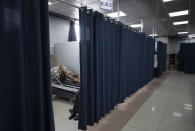 A Palestinian patient infected with COVID-19 is placed under medical observation at the emergency unit, at the Palestine Medical Complex, in the West Bank city of Ramallah, Tuesday, March 2, 2021. (AP Photo/Nasser Nasser)