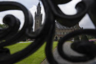 The Peace Palace office of the International Court of Justice, or World Court, is pictured through a fence in The Hague, Netherlands, Thursday, May 16, 2024. The U.N.'s top court opened two days of hearings in a case brought by South Africa to see whether Israel needs to take additional measures to alleviate the suffering in war-ravaged Gaza. (AP Photo/Peter Dejong)