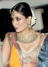 The couple recently hosted their wedding sangeet at Saif’s Bandra residence. Kareena wore a yellow ghagra with intricate embroidered choli designed by Manish Malhotra. She wore plain green bangles and gold choker jewellery set. I am sure she must have been appreciated for her distinct style at her wedding Sangeet.<br> <p class="MsoNormal"><a href="http://in.omg.yahoo.com/photos/saif-kareena-husband-and-wife-finally-slideshow/" data-ylk="slk:Saif, Kareena husband and wife, finally;elm:context_link;itc:0;sec:content-canvas;outcm:mb_qualified_link;_E:mb_qualified_link;ct:story;" class="link  yahoo-link">Saif, Kareena husband and wife, finally</a></p>