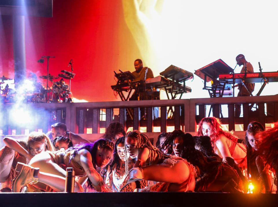 Doja Cat makes her entrance onto the main stage from below during the Coachella Valley Music and Arts Festival in Indio, Calif., Sunday, April 17, 2022. 