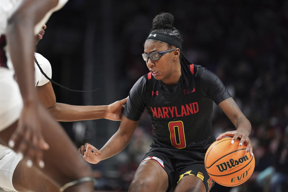 Maryland guard Shyanne Sellers (0) dribbles during the first half of an NCAA college basketball game against South Carolina, Sunday, Dec. 12, 2021, in Columbia, S.C. (AP Photo/Sean Rayford)