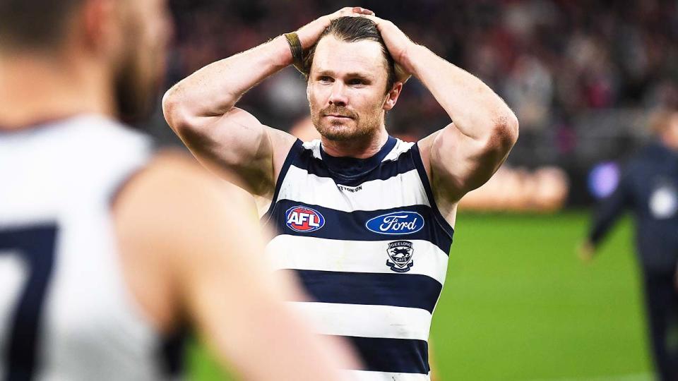 Patrick Dangerfield (pictured) looking dejected after Geelong's AFL preliminary final loss.