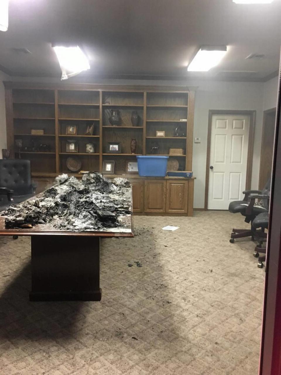 Sheriff’s deputies discovered charred loan documents spread out on a board room table when they were called to the Enloe State Bank in Cooper, Texas on May 11, 2019.