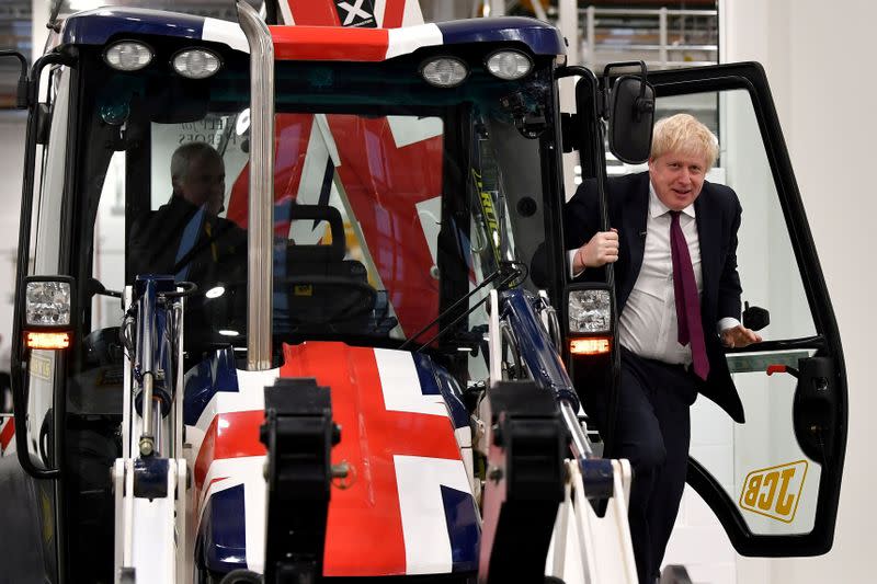 FILE PHOTO: Britain's Prime Minister and Conservative leader Boris Johnson campaigns in Uttoxeter