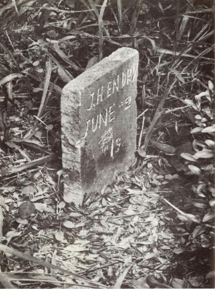 The original grave marker for John Hendrix.