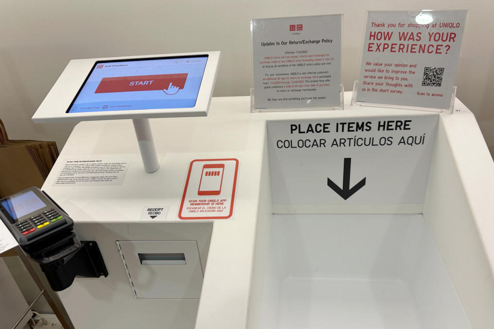 A self-checkout station is shown at a Uniqlo store in New York on Wednesday, Dec. 6, 2023. Self-checkout faces a reckoning of sorts just as retailers are in the midst of their busiest time of the year. (AP Photo/Anne D'Innocenzio)