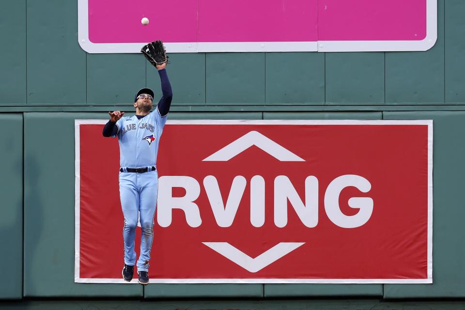 Toronto Blue Jays' Kevin Kiermaier catches a flyout by Boston Red Sox's Enmanuel Valdez during the third inning of a baseball game, Thursday, May 4, 2023, in Boston. (AP Photo/Michael Dwyer)
