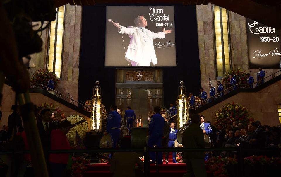 The urn containing the remains of Mexico's late Latin music legend Juan Gabriel is seen at Mexico City's ornate Palace of Fine Arts.