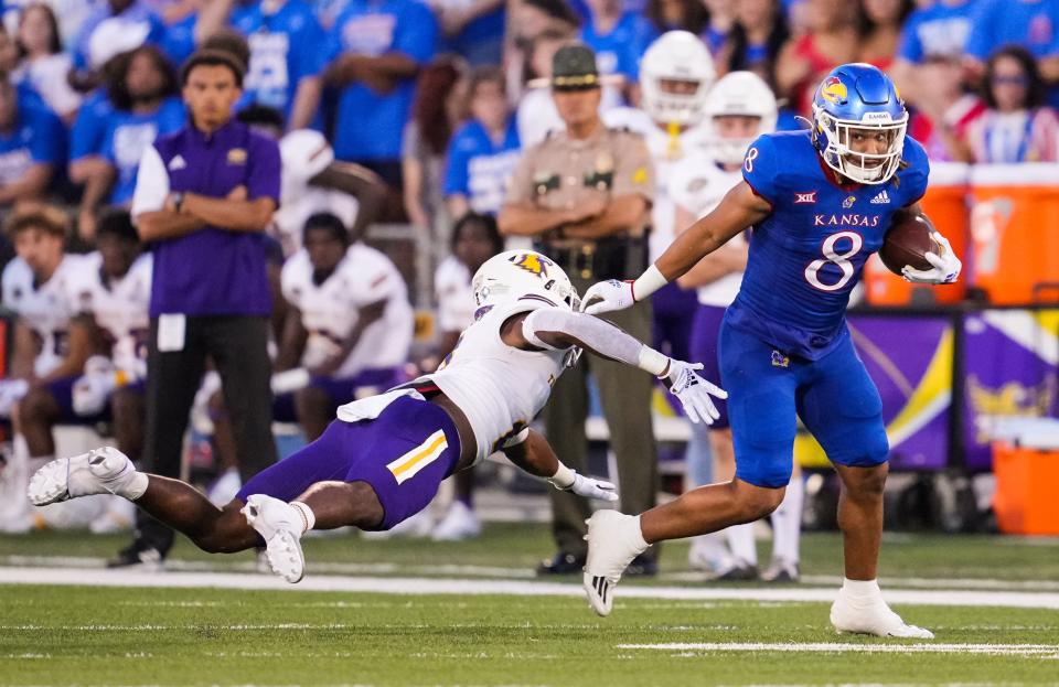 Kansas running back Ky Thomas (8) runs the ball against Tennessee Tech during the first half of a Sept. 2 game at David Booth Kansas Memorial Stadium in Lawrence.