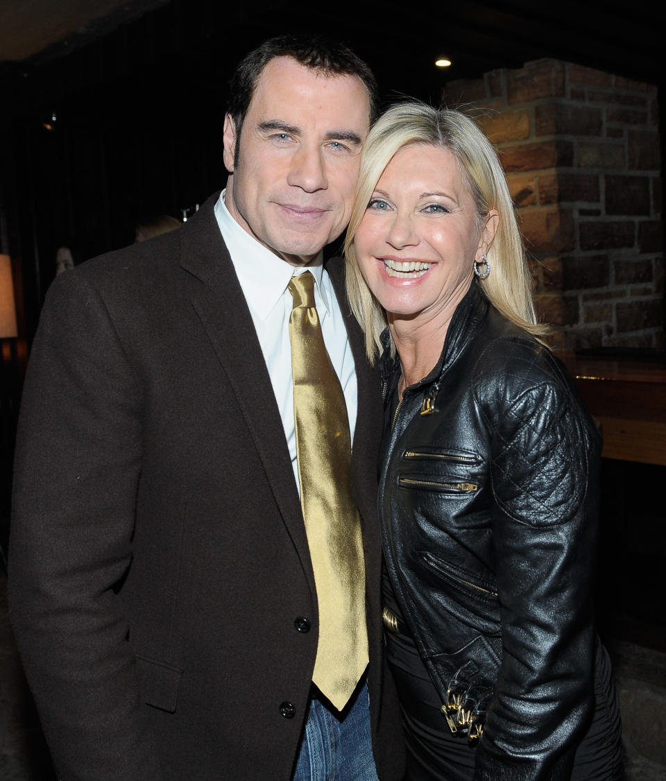 John Travolta says Olivia Newton-John is doing “fine” as she battles breast cancer for the third time. Photo: Getty Images