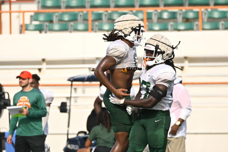 Florida A&M University linebackers Isaiah Major (left) and Nadarius Fagan (right) celebrates after a play in team’s first fall scrimmage, Aug. 6, 2022