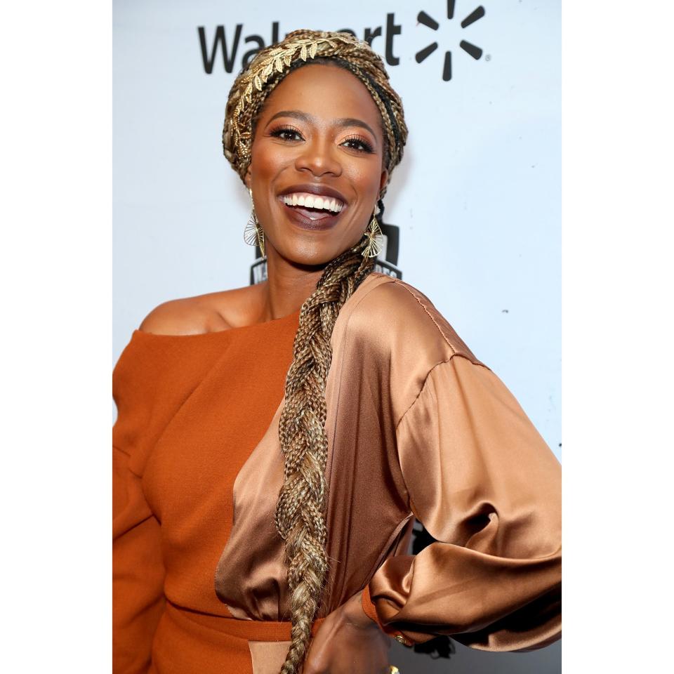 Yearning to play with a bit of color but don't want to commit to one hue? Take a page from <em>Insecure</em> actress Yvonne Orji's book, who got box braids with blonde and brown extensions, but kept her roots black so she can have a bit of fun without having to <a href="https://www.allure.com/gallery/dye-natural-hair-bright-colors-no-bleach?mbid=synd_yahoo_rss" rel="nofollow noopener" target="_blank" data-ylk="slk:lighten her own hair;elm:context_link;itc:0;sec:content-canvas" class="link ">lighten her own hair</a>. Intricately styled with a big side fishtail braid on one side and bangs swept across the other, this style has a beautiful gradient effect.