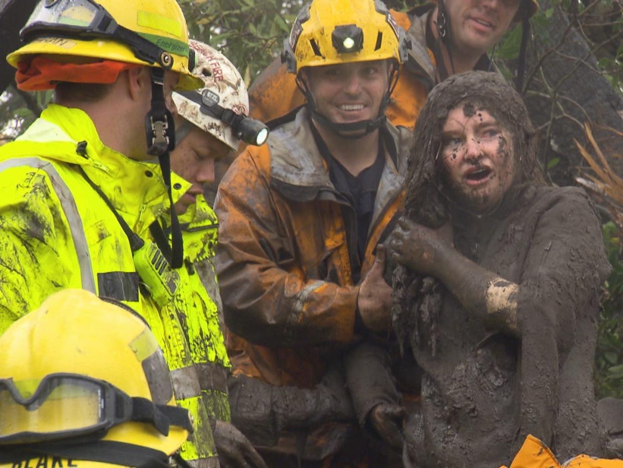 Teenager Lauren Cantin, who is covered in mud, after her rescue from being buried alive in a mudslide.