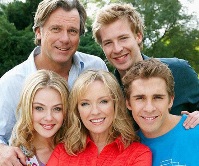 A photo of Packed To The Rafters cast members Rebecca Gibney (Julie Rafter), Erik Thomson (Dave Rafter), Jessica Marais (Rachel Rafter), Hugh Sheridan (Ben Rafter), Angus McLaren (Nathan Rafter)