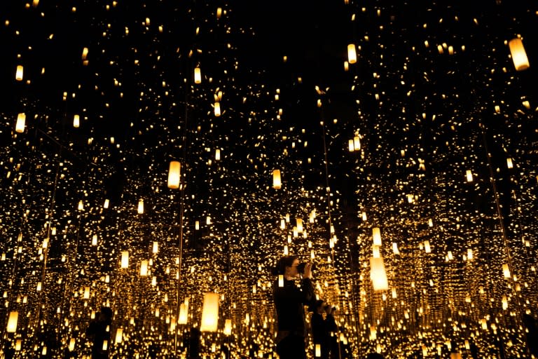 The flickering lanterns in "Infinity Mirrored Room -- Aftermath of Obliteration of Eternity" (2009) are reminiscent of Japan's "toro nagashi" summer ceremony, when paper lanterns are floated down the river to honor ancestors