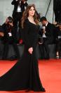 <p>The Italian icon wore a classic black gown with a statement diamond necklace.</p>