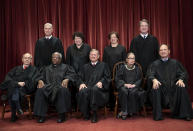 FILE - In this Nov. 30, 2018, file photo, the justices of the U.S. Supreme Court gather for a formal group portrait to include the new Associate Justice, top row, far right, at the Supreme Court Building in Washington. Seated from left: Associate Justice Stephen Breyer, Associate Justice Clarence Thomas, Chief Justice of the United States John G. Roberts, Associate Justice Ruth Bader Ginsburg and Associate Justice Samuel Alito Jr. Standing behind from left: Associate Justice Neil Gorsuch, Associate Justice Sonia Sotomayor, Associate Justice Elena Kagan and Associate Justice Brett M. Kavanaugh. (AP Photo/J. Scott Applewhite, File)