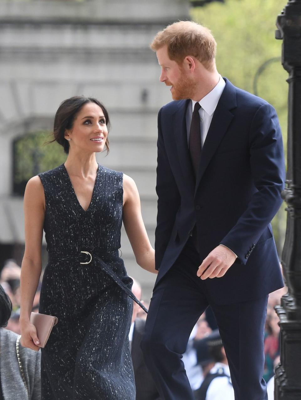 <p>Markle looked up to her husband-to-be with admiration and love as they attended a memorial service to commemorate the 25th anniversary of the murder of Stephen Lawrence in April 2018. </p>