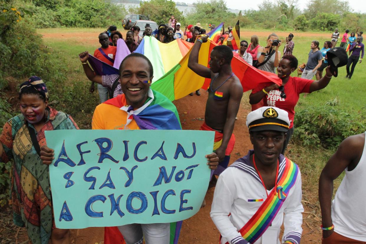 LGBT activists attend Uganda's first gay pride parade at the Entebbe Botanical Gardens in Kampala, Uganda: EPA/ RACHEL ADAMS