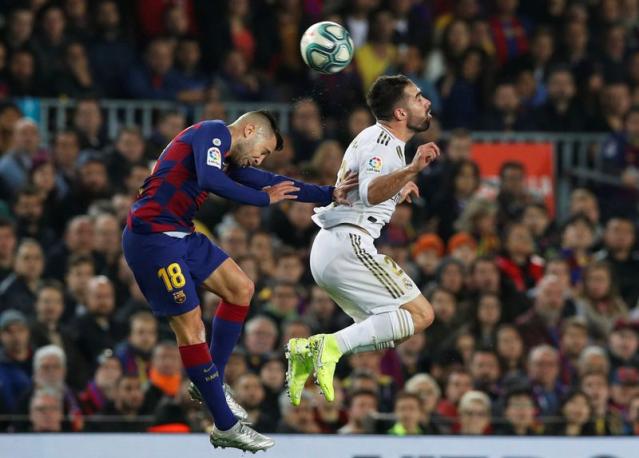 Barcelona and Real Madrid share spoils in goalless 'Clasico' marked by  Catalan protests