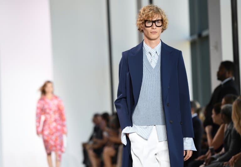 A model displays fashions during the Michael Kors Spring 2017 Runway Show during New York Fashion Week