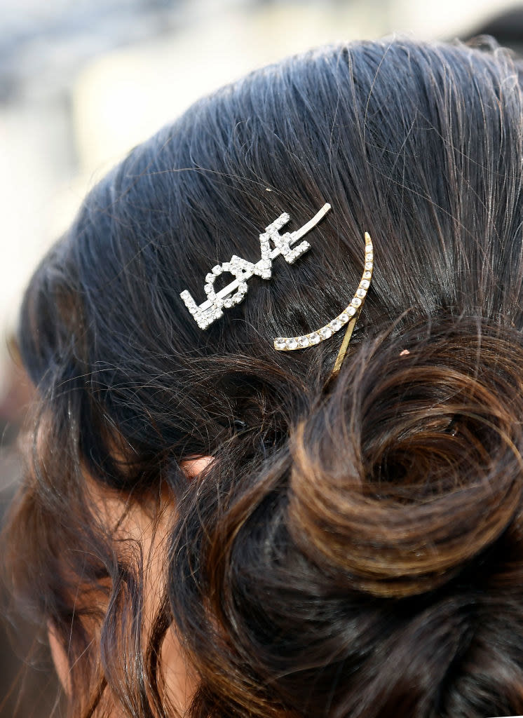 A closeup of Gemma's hair with jeweled barrettes