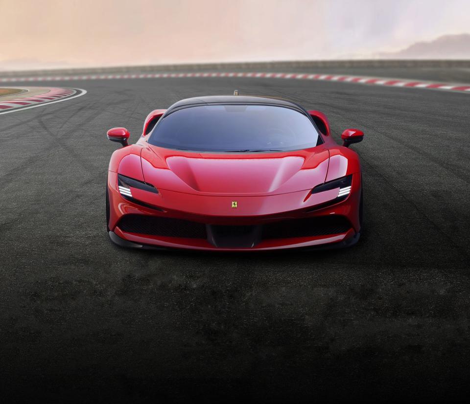 <p>Ferrari's successor to the LaFerrari, <a href="https://www.caranddriver.com/news/a27630393/ferrari-sf90-stradale-photos-info/" rel="nofollow noopener" target="_blank" data-ylk="slk:the new SF90 Stradale;elm:context_link;itc:0;sec:content-canvas" class="link ">the new SF90 Stradale</a> is also its first plug-in hybrid. This is no fuel-economy play, however. The SF90's twin-turbocharged 4.0-liter V-8 and trio of electric motors combine to produce 986 horsepower. Ferrari claims the car will be capable of accelerating to 62 mph in 2.5 seconds; the top speed is quoted as 211 mph. Need more reasons to be impressed? Ferrari says the SF90 Stradale's 1:19 lap time around the Fiorano test track is 0.7 second quicker than the mighty LaFerrari's. <br></p>