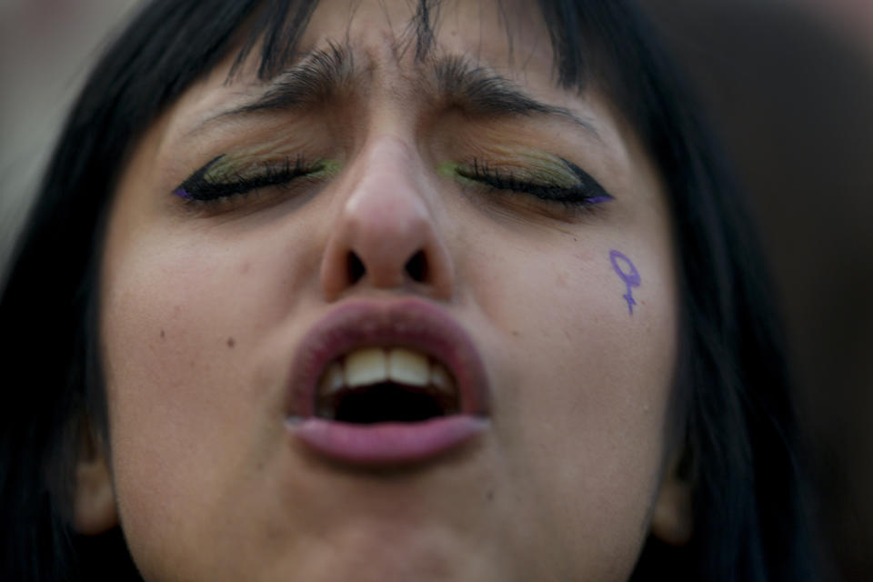 A woman participates in a march marking the ninth anniversary of the "Ni Una Menos," or Not One Less, women's movement in Buenos Aires, Argentina, Monday, June 3, 2024. (AP Photo/Natacha Pisarenko)