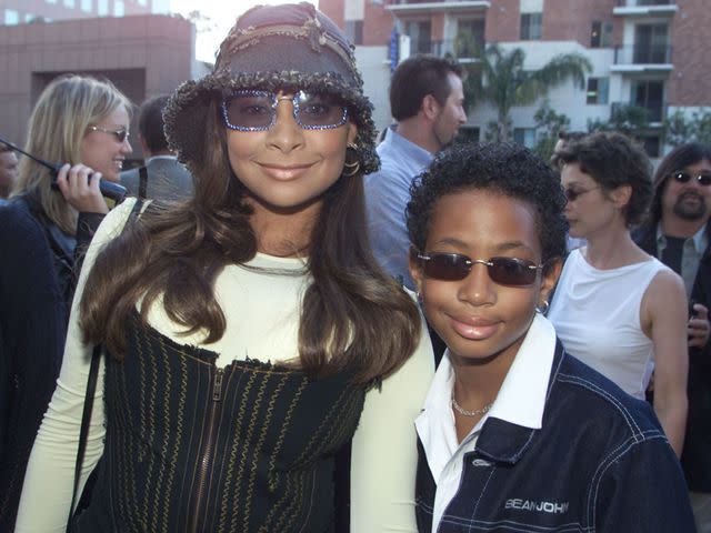 <p>Kevin Winter/Getty</p> Raven Symone and her brother Blaize at Los Angeles the premiere of 'Dr. Dolittle 2' in 2001.
