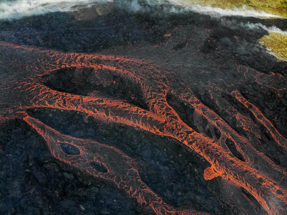 Eruptions in this region of Iceland tend to flow rather than being explosive, as residents saw in July 2023 and in 2021-22. <a href="https://gettyimages.com/detail/news-photo/this-aerial-photograph-taken-on-july-10-2023-shows-flowing-news-photo/1520071527" rel="nofollow noopener" target="_blank" data-ylk="slk:Kristinn Magnusson/AFP via Getty Images;elm:context_link;itc:0;sec:content-canvas" class="link ">Kristinn Magnusson/AFP via Getty Images</a>