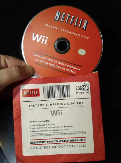 Netflix Instant Streaming Disc for Wii with packaging. Instructions include: insert the disc in your Wii, choose what's available, and enjoy immediately. Do not return disc