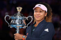 Tennis - Australian Open - Women's Singles Final - Melbourne Park, Melbourne, Australia, January 26, 2019. Japan's Naomi Osaka poses with the trophy after winning her match against Czech Republic's Petra Kvitova. REUTERS/Lucy Nicholson