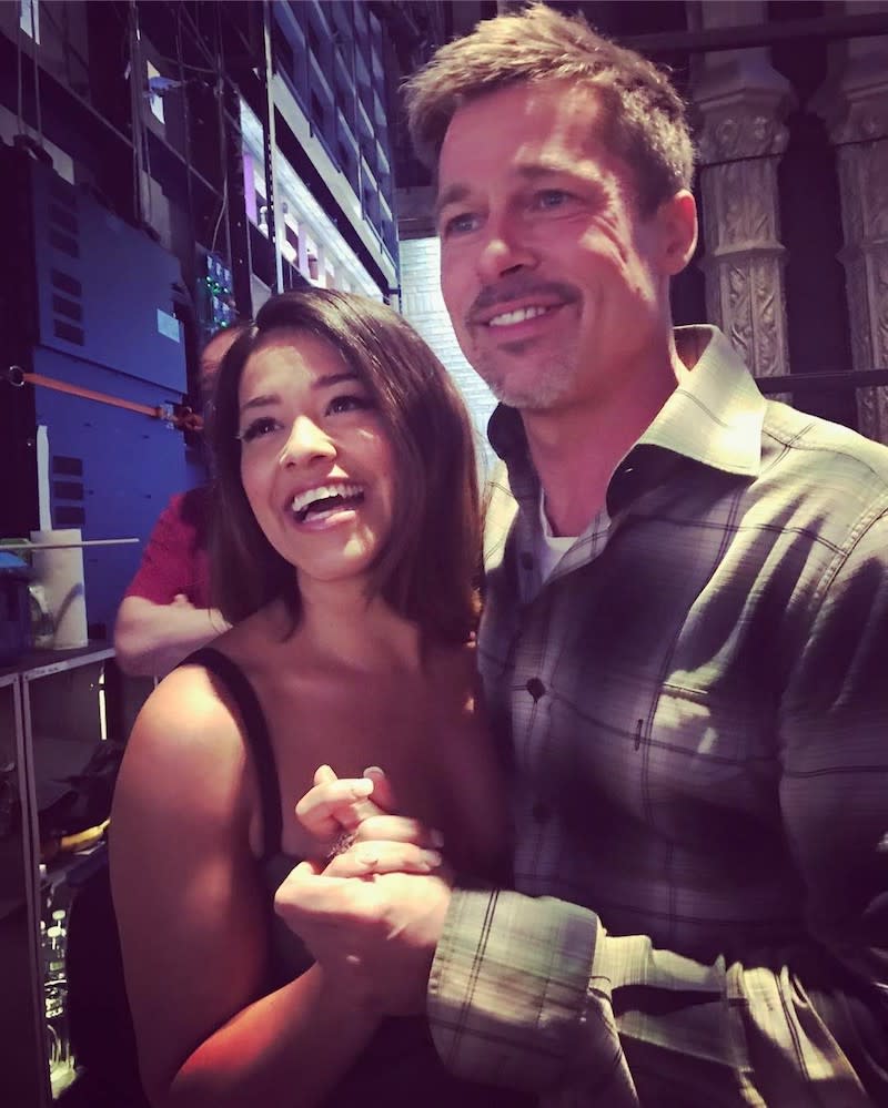 <p>The <em>Jane the Virgin</em> star and Brad Pitt make a cute couple, no? The two were all smiles while posing backstage at <em>The Late Show With Stephen Colbert</em>. “Prom Pic with Brad Pitt,” bragged Rodriguez. “No biggie.”(Photo: <a rel="nofollow noopener" href="https://www.instagram.com/p/BUKq3H2g4AB/" target="_blank" data-ylk="slk:Gina Rodriguez via Instagram;elm:context_link;itc:0;sec:content-canvas" class="link ">Gina Rodriguez via Instagram</a>) </p>
