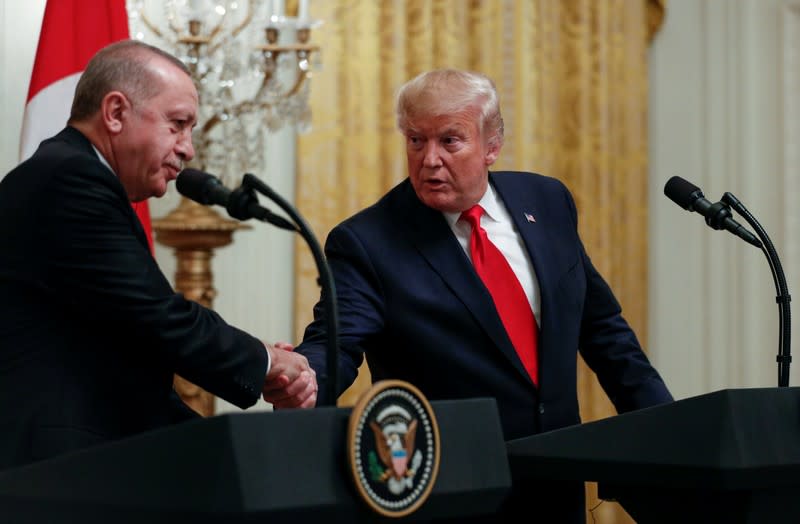 FILE PHOTO: U.S. President Donald Trump and Turkey's President Tayyip Erdogan hold a joint news conference at the White House in Washington