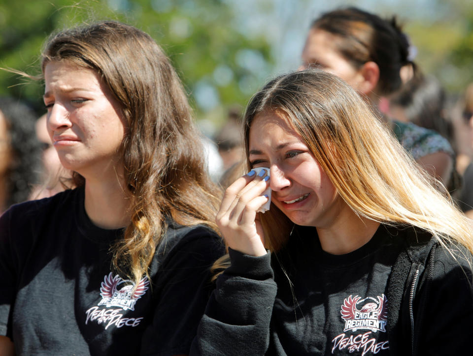 Students mourn during a community prayer vigil for victims of&nbsp;Wednesday's shooting.