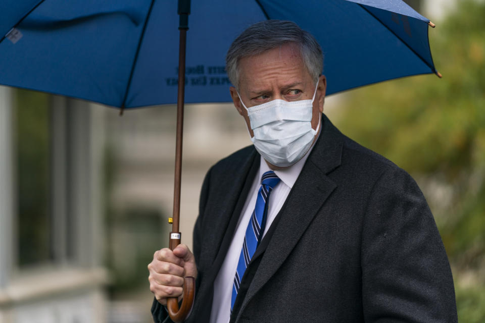 White House chief of staff Mark Meadows responds to reporters questions outside the West Wing on the North Lawn of the White House, Sunday, Oct. 25, 2020, in Washington. (AP Photo/Manuel Balce Ceneta)