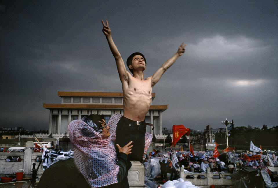 <p>Tiananmen Square, Beijing, China, 1989. “‘Man is free, but men aren’t. There are no limits to the freedom of one, there is no freedom for all. All is an empty room, a clumsy abstraction until one finds one’s independence is lost’ — Louis Aragon (1925). This photograph was taken in late May 1989, during the Tiananmen Square uprising, led by Chinese students and their supporters. They were protesting corruption and activating for freedom of expression.” (© Stuart Franklin/Magnum Photos) </p>