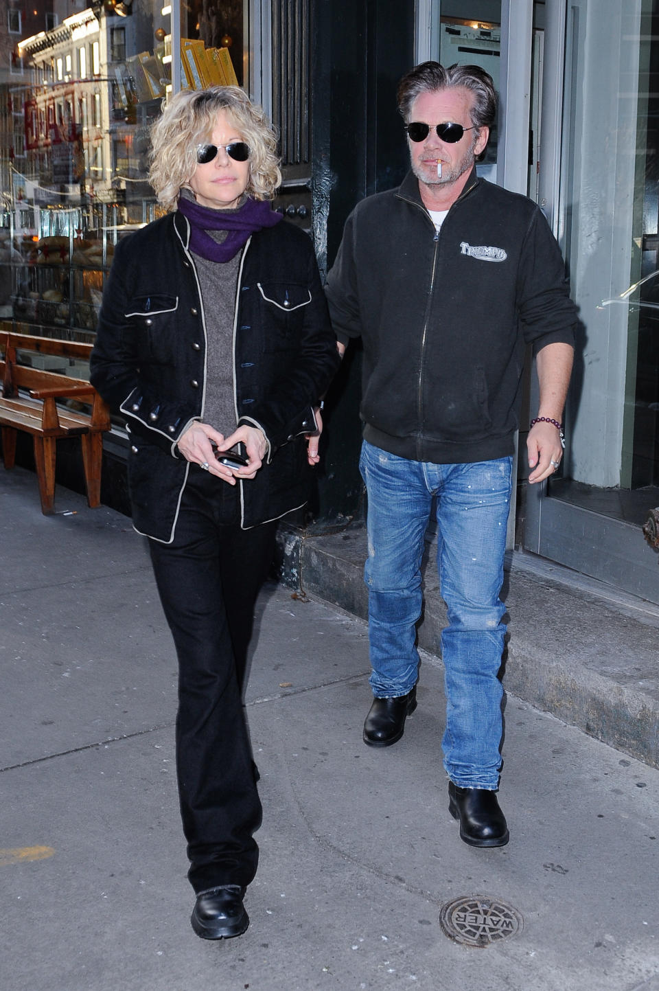 NEW YORK - JANUARY 05:  Actress Meg Ryan (L) and singer John Mellencamp leave E.A.T. restaurant on January 5, 2011 in New York City.  (Photo by Ray Tamarra/Getty Images)