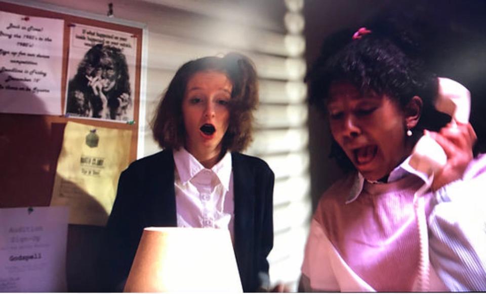 Kate Williamson, left, and Jocylon Evans perform in "No Duh," a 1980s teen short film.