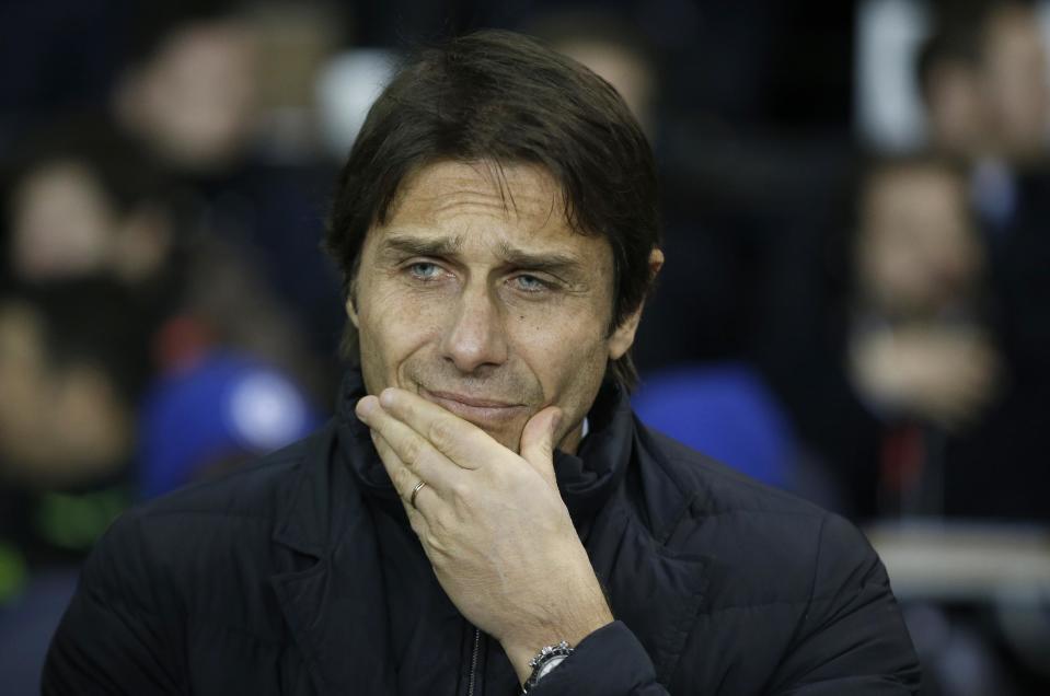 <p>Chelsea’s manager Antonio Conte looks on from the sideline ahead of the English Premier League soccer match between Tottenham Hotspur and Chelsea at White Hart Lane stadium in London, Wednesday, Jan. 4, 2017. (AP Photo/Alastair Grant) </p>