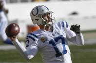 Indianapolis Colts quarterback Philip Rivers warms up before an NFL football game against the Pittsburgh Steelers, Sunday, Dec. 27, 2020, in Pittsburgh. (AP Photo/Don Wright)