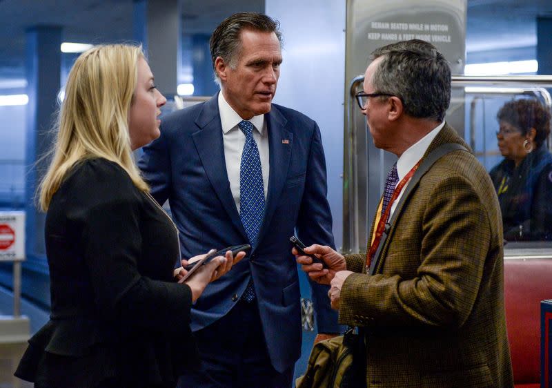Sen. Mitt Romney (R-UT) speaks as he walks through the Senate subway on his way to the Senate impeachment trial of President Donald Trump in Washington