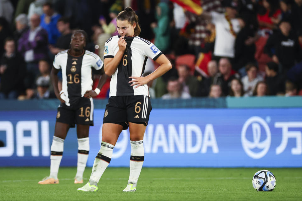 Germany's Lena Oberdorf, right, and Nicole Anyomi react following the Women's World Cup Group H soccer match between South Korea and Germany in Brisbane, Australia, Thursday, Aug. 3, 2023. (AP Photo/Tertius Pickard)