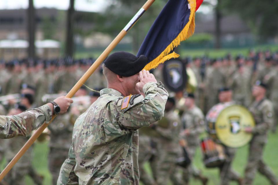 A soldier salutes during the 2022 Week of the Eagles Division review at Fort Campbell.